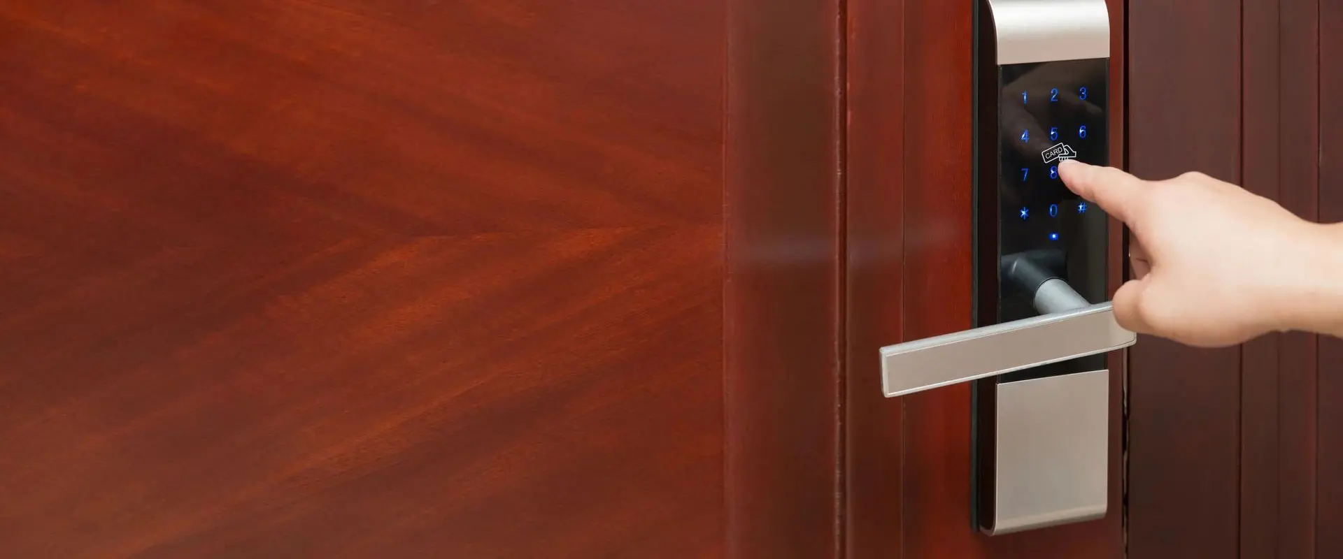 A close up of the door handle on a cabinet