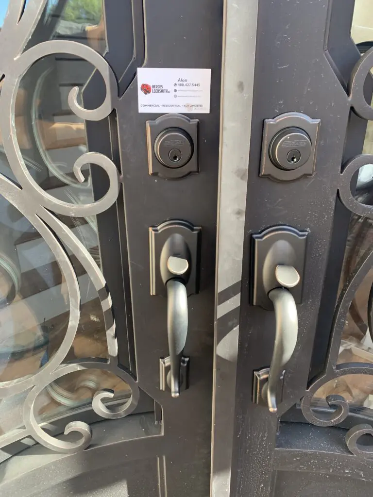 A close up of two doors with locks on them